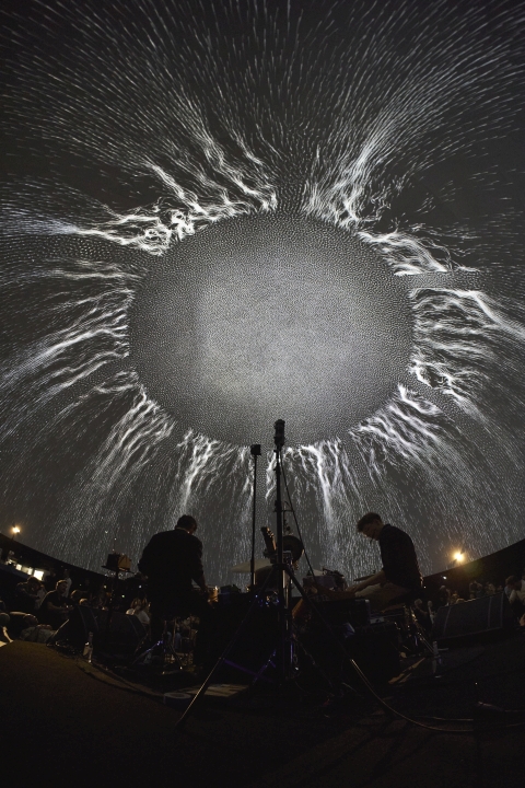 Florian König and Simon Popp playing live drums in a full dome projection at Deutsches Museum Munich
