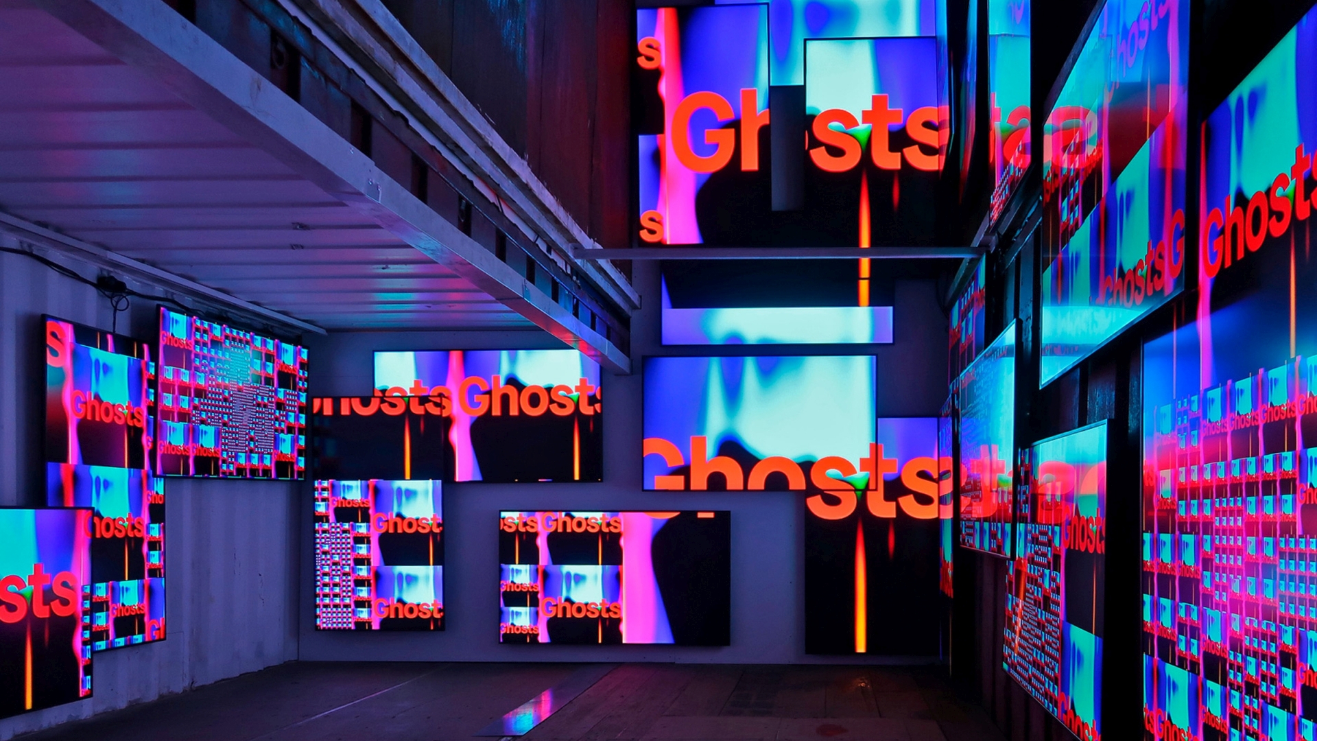 Screens filling the container with a red and blue 'Ghosts' cover at IN BETWEEN, Reeperbahn Festival 2022, Hamburg