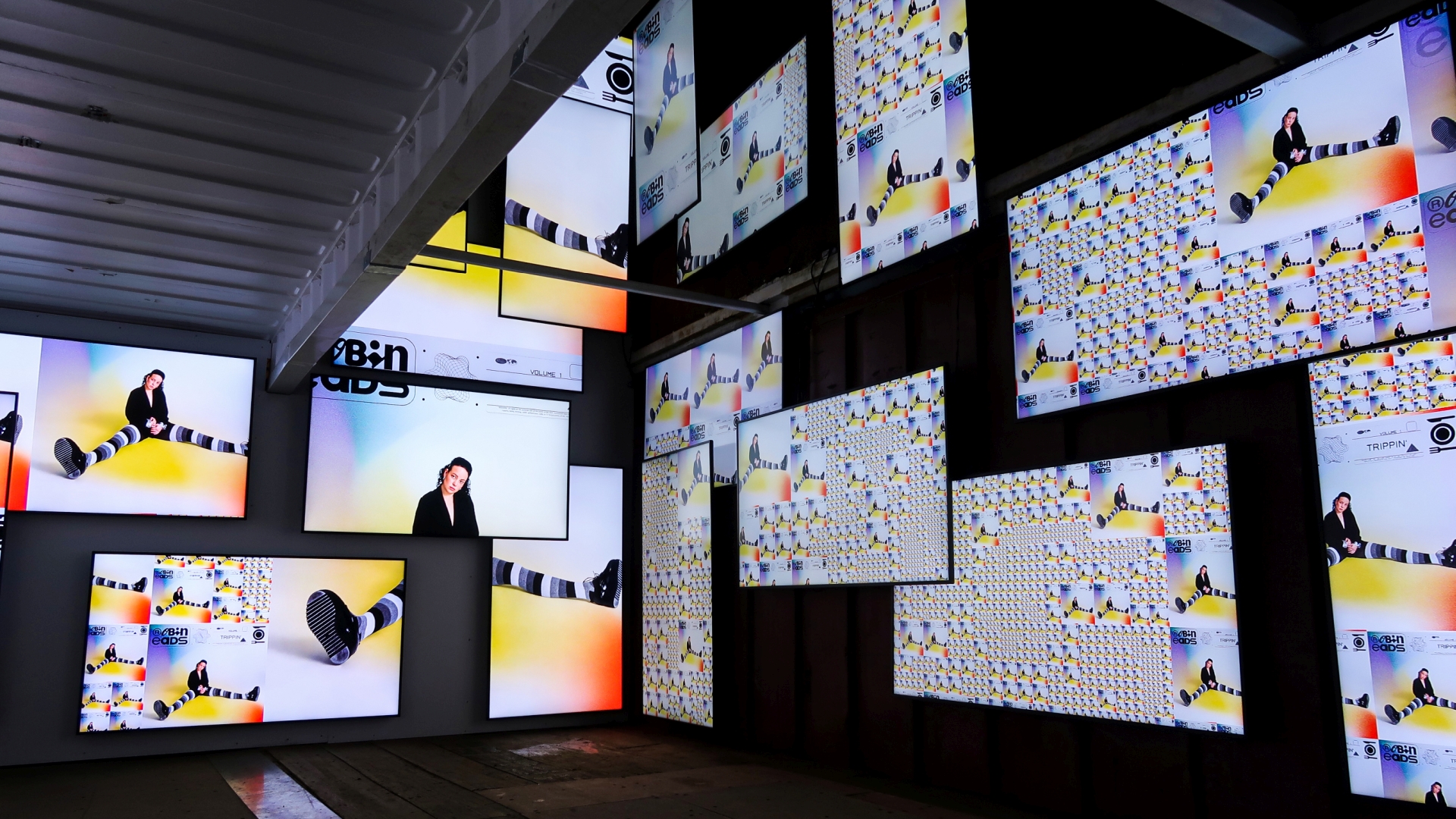 Covers in random sizes across 24 screens in a shipping container at IN BETWEEN, Reeperbahn Festival 2022, Hamburg